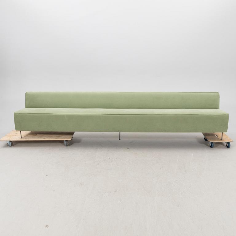 A sofa Modern Line' by Greta Magnusson Grossman, produced by Gubi, contemporary.