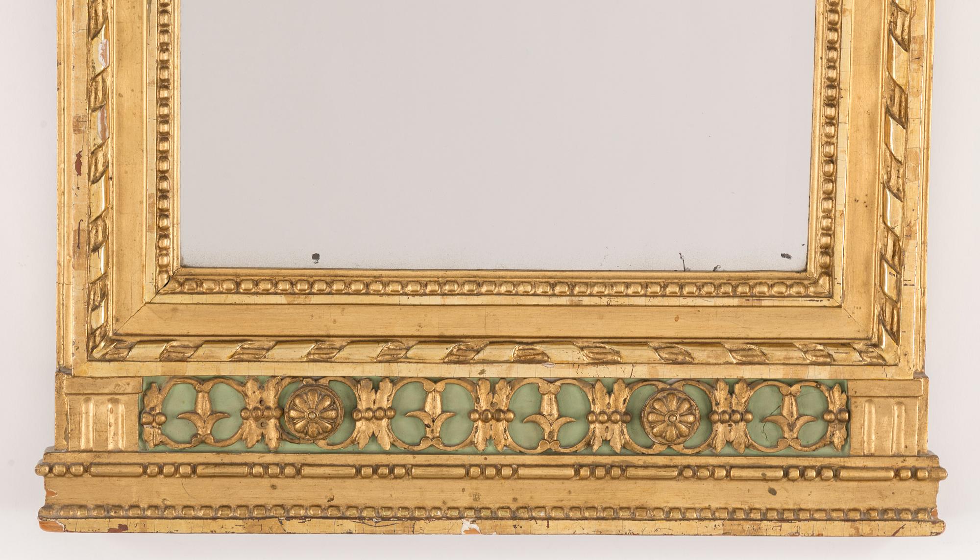 A late gustavian mirror, Stockholm hallmark 1793.