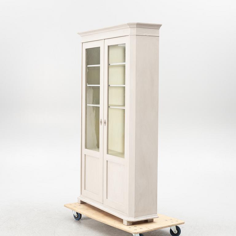 A book cabinet, circa 1900.