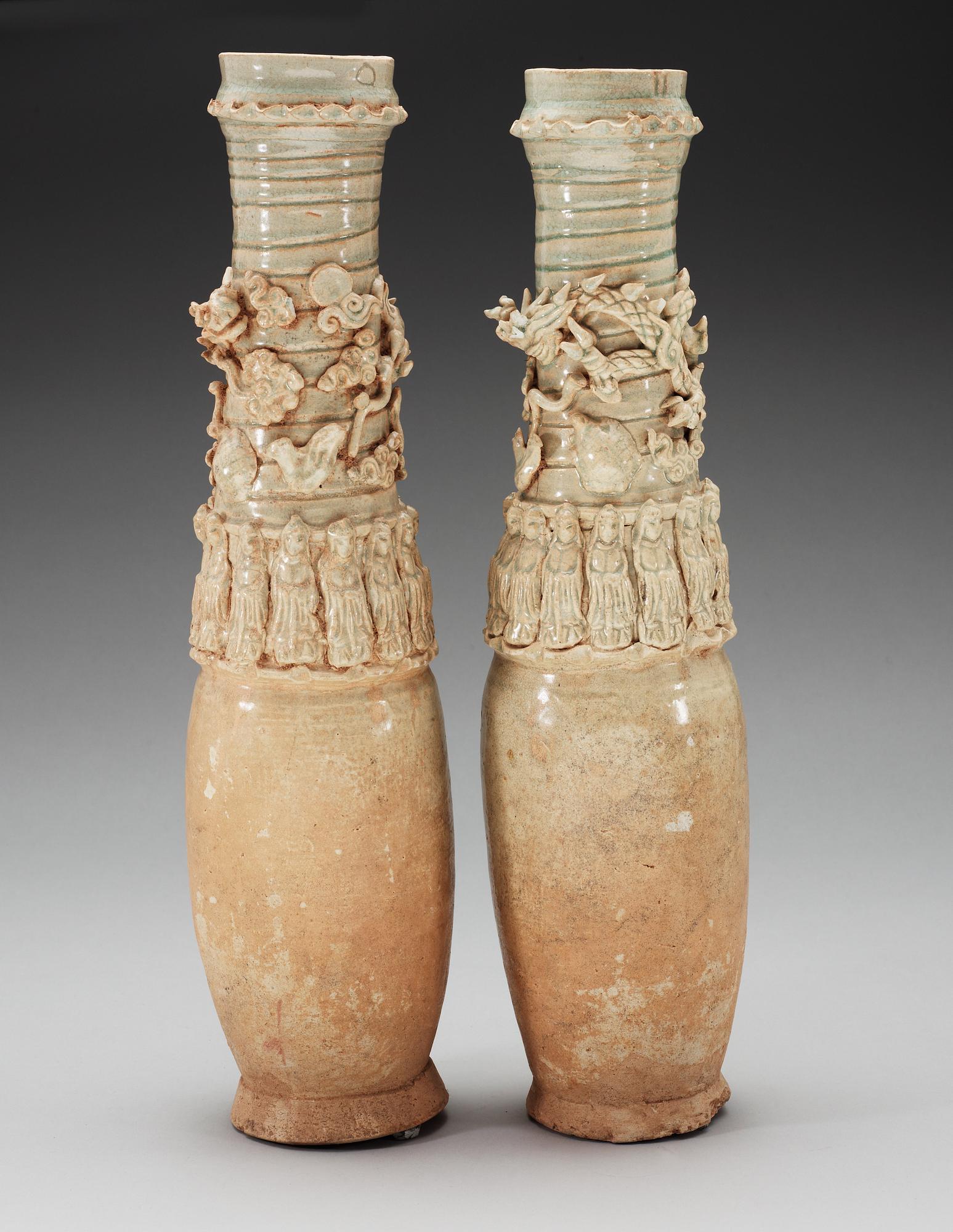 A set of two green glazed vases with covers, Yuan dynasty (1271-1368).