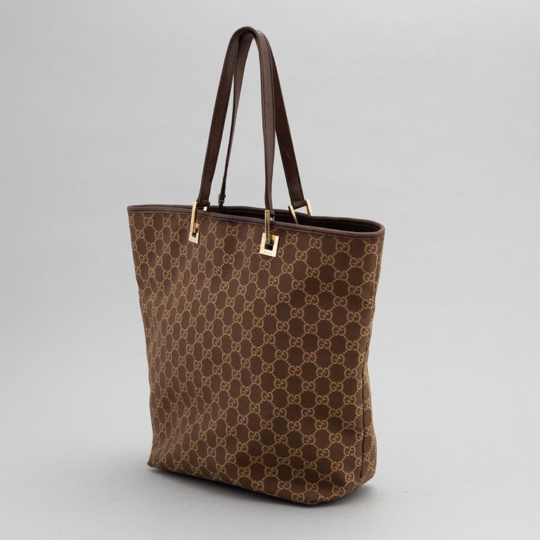 Gucci, a monogram canvas handbag.