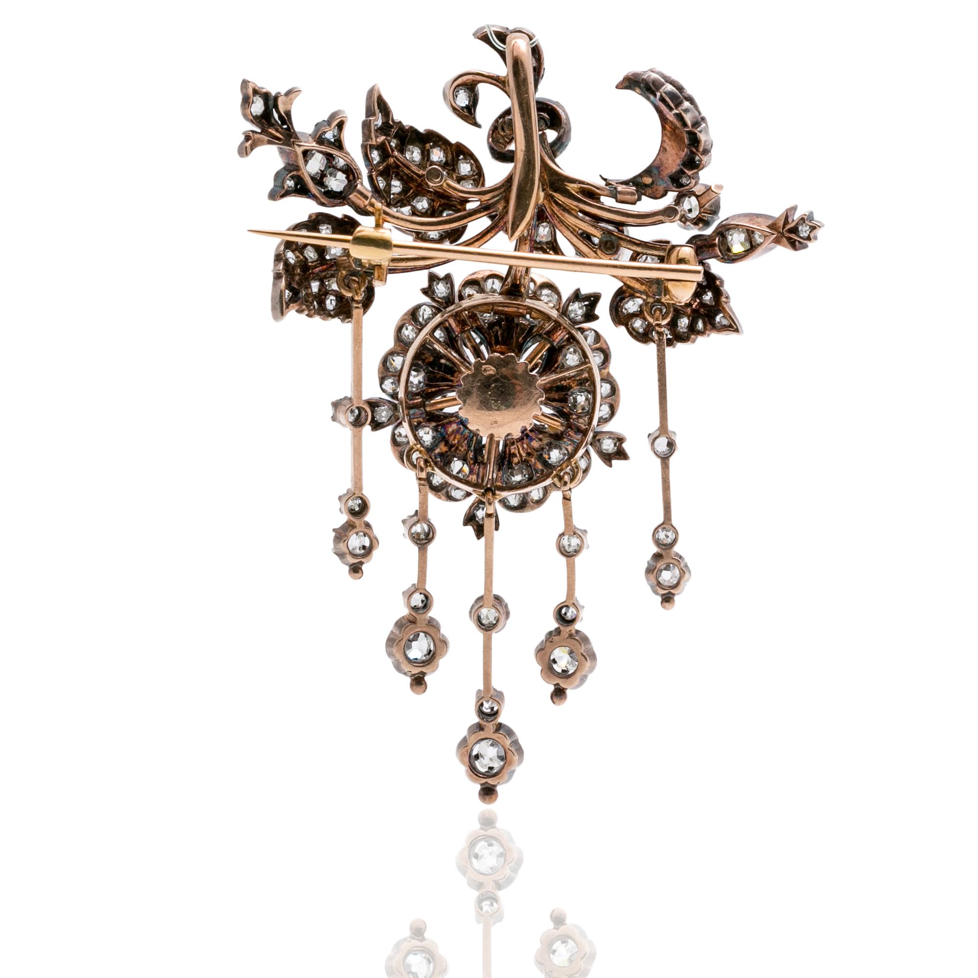 An antique-cut diamond pendant/brooch.