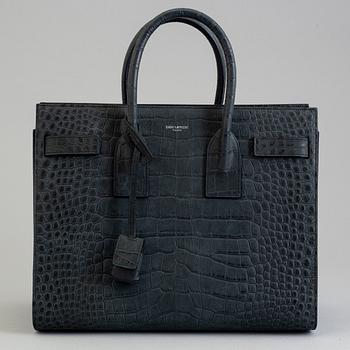 A bag by Yves Saint Laurent, "Sac du jour".