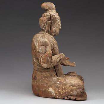 A wooden sculpture of a seated Bodhisattva, presumably Ming dynasty (1368-1644).