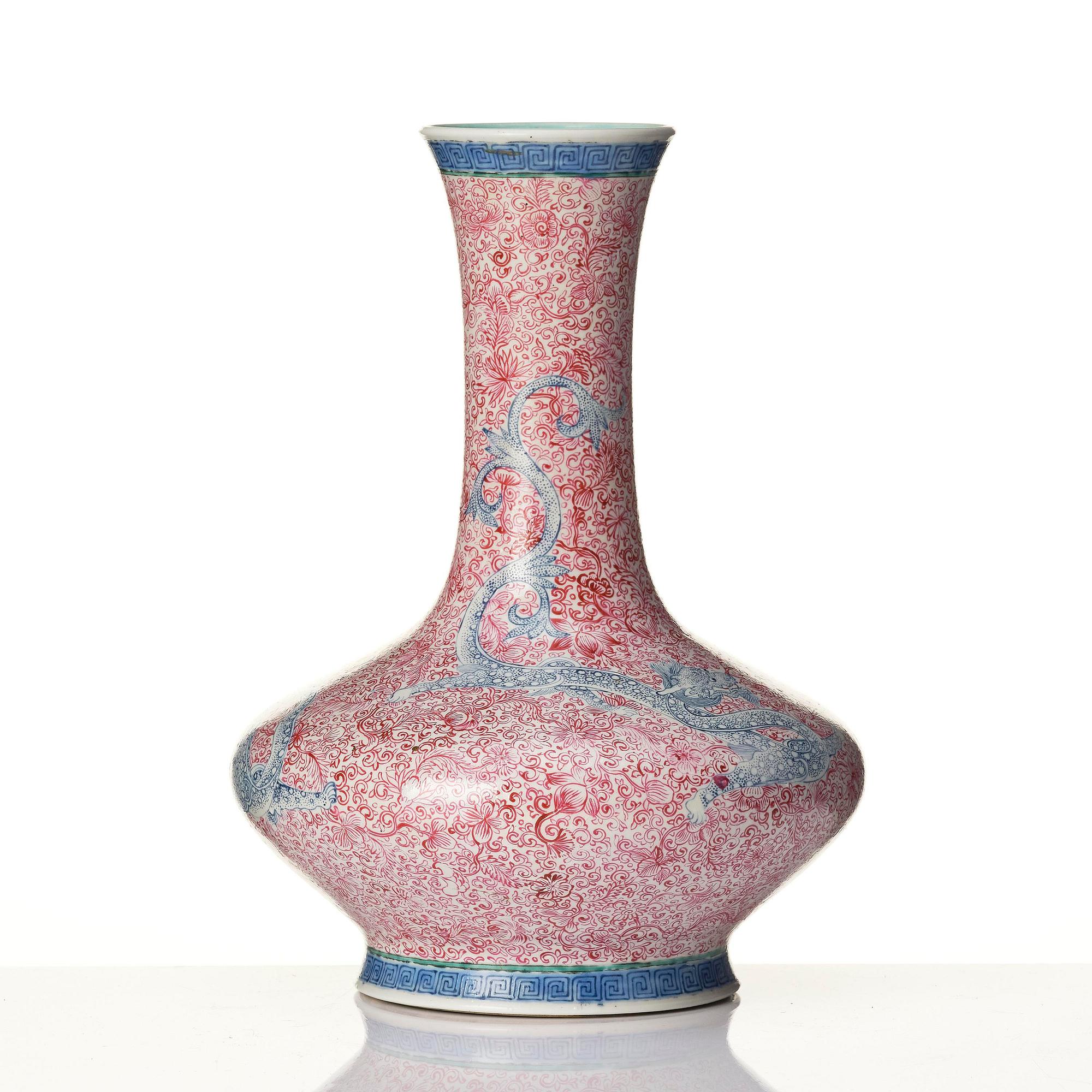 A rare pink and blue enamelled vase with dragons, late Qing dynasty/Republic with an apocryphal Qianlong mark.