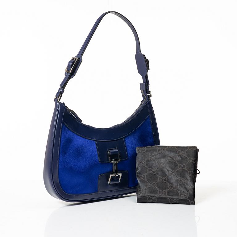 Gucci, a blue leather and fabric bag.