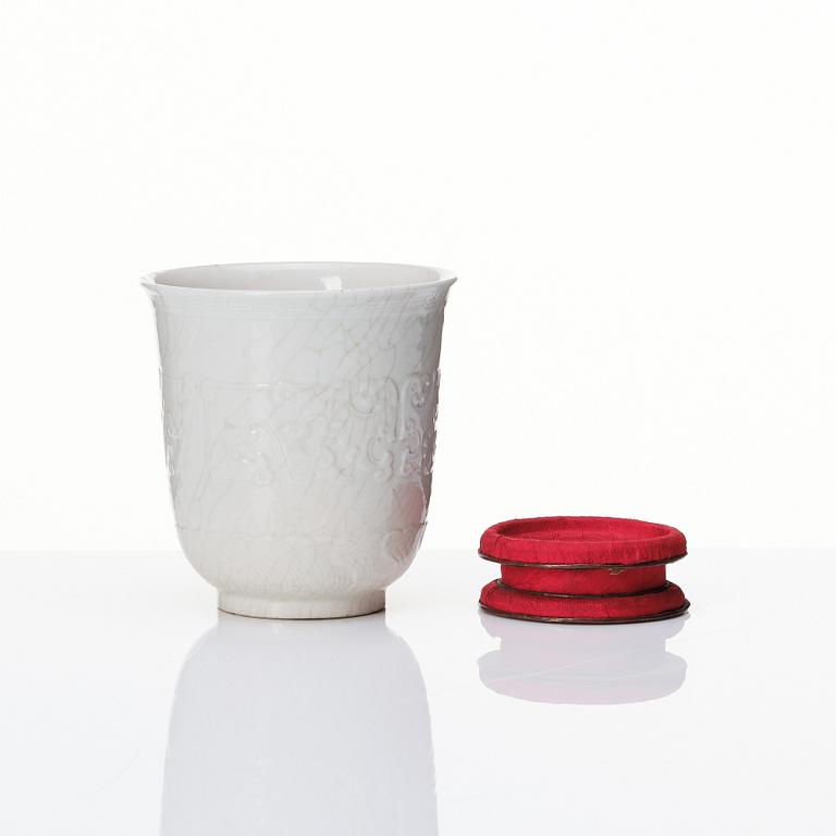 A Chinese blanc de chine cup and dish, Qing dynasty, Kangxi (1662-1722).