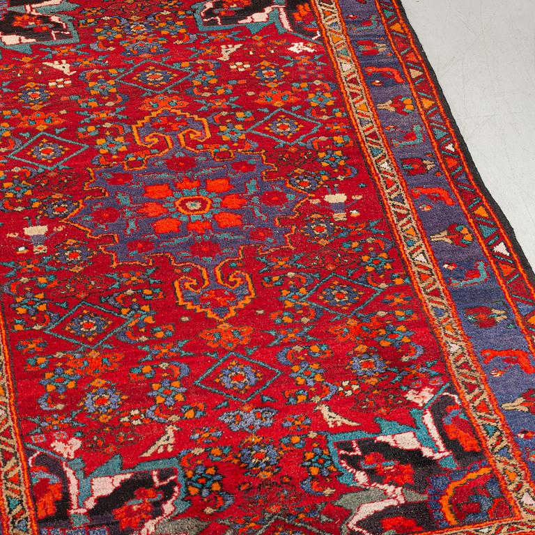 An old Nahavand carpet ca 215 x 130 cm.