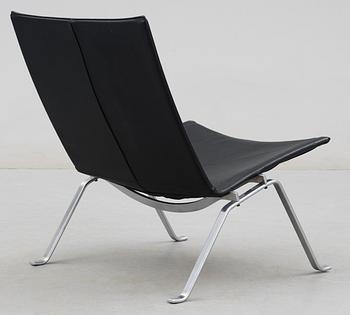 A Poul Kjaerholm "PK-22" black leather and steel easy chair, E Kold Christensen.