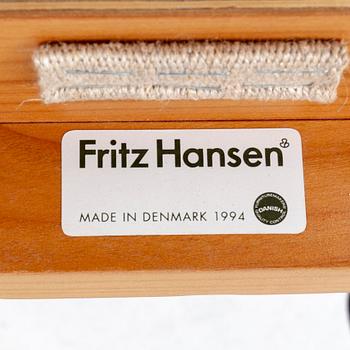 Hans J Wegner, a Kina-stilen armchair for Fritz Hansen, Denmark, dated 1994.