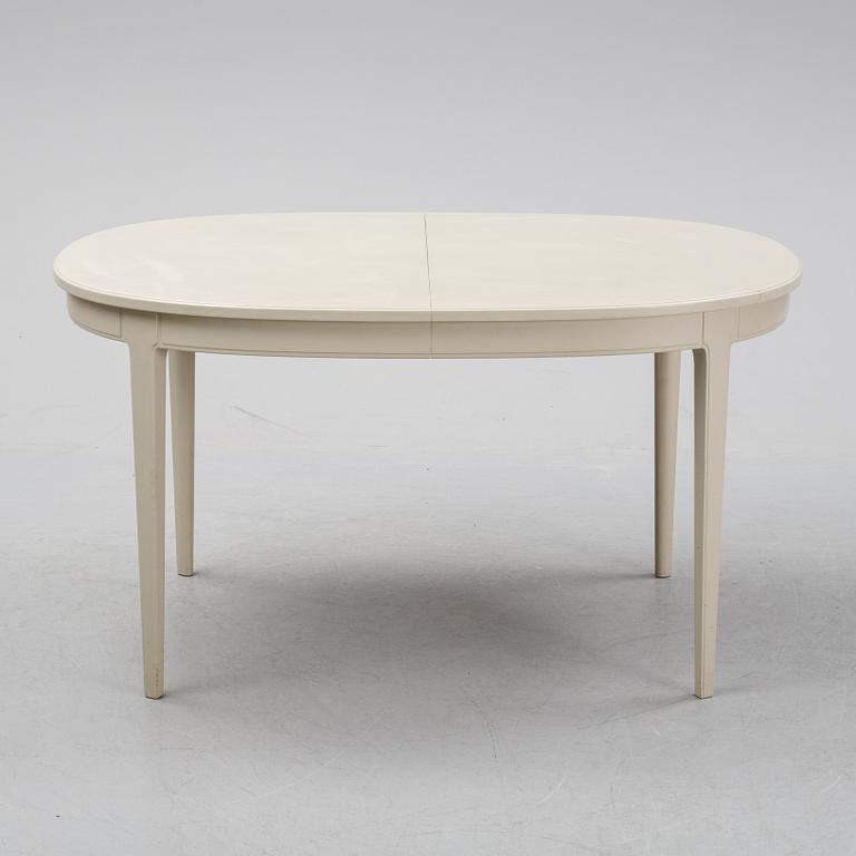 A dining table and six chairs by Carl Malmsten for Bodafors.