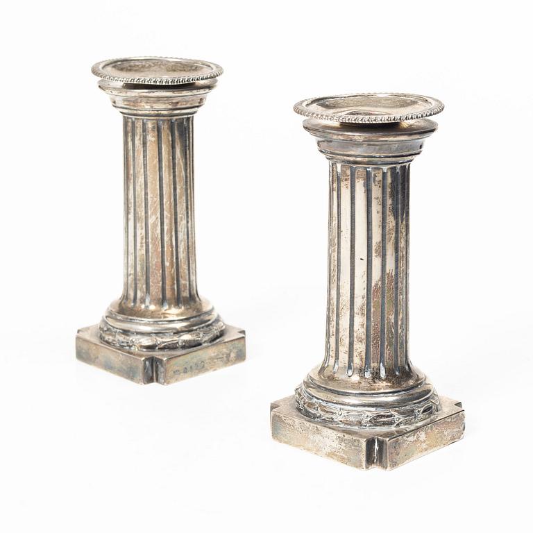 A pair of English silver candlesticks, mark of Arthur Sibley, London 1872.