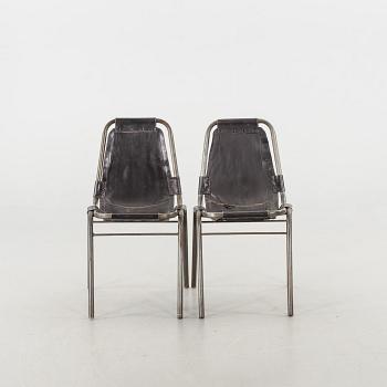 A COUPLE OF CHAIRS.