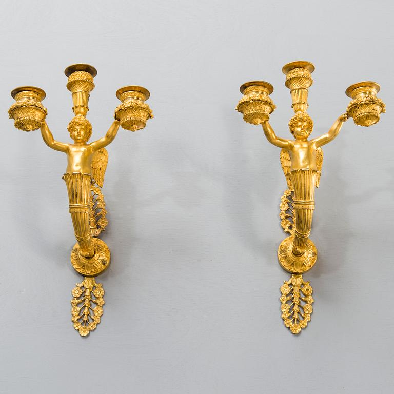 A PAIR OF WALL CANDELABRAS, France, empire first half of the 19th century, ormolu.