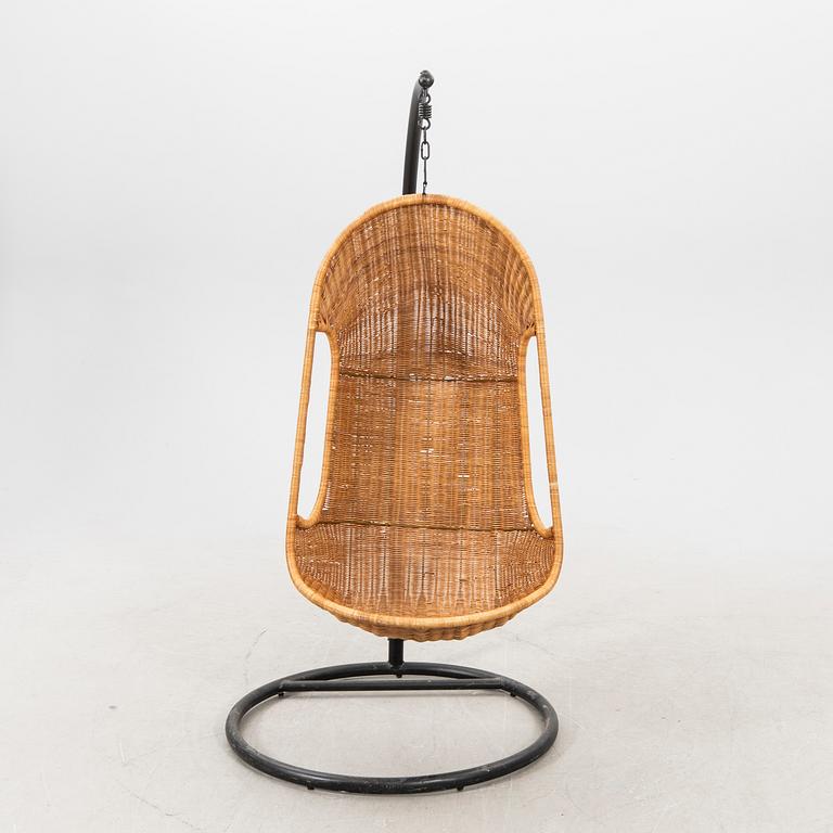 A late 20th century rattan hanging chair.