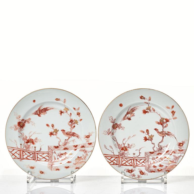 A set of nine rouge de fer decorated plates, Qing dynasty, early 18th Century.