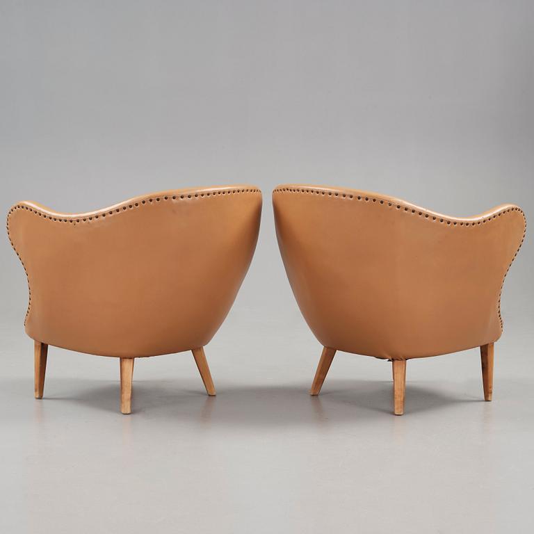 Arne Norell, A pair of Arne Norell 'Tummen/ The Thumb' easy chairs, Gösta Westerbergs Möbler, Stockholm 1950's.
