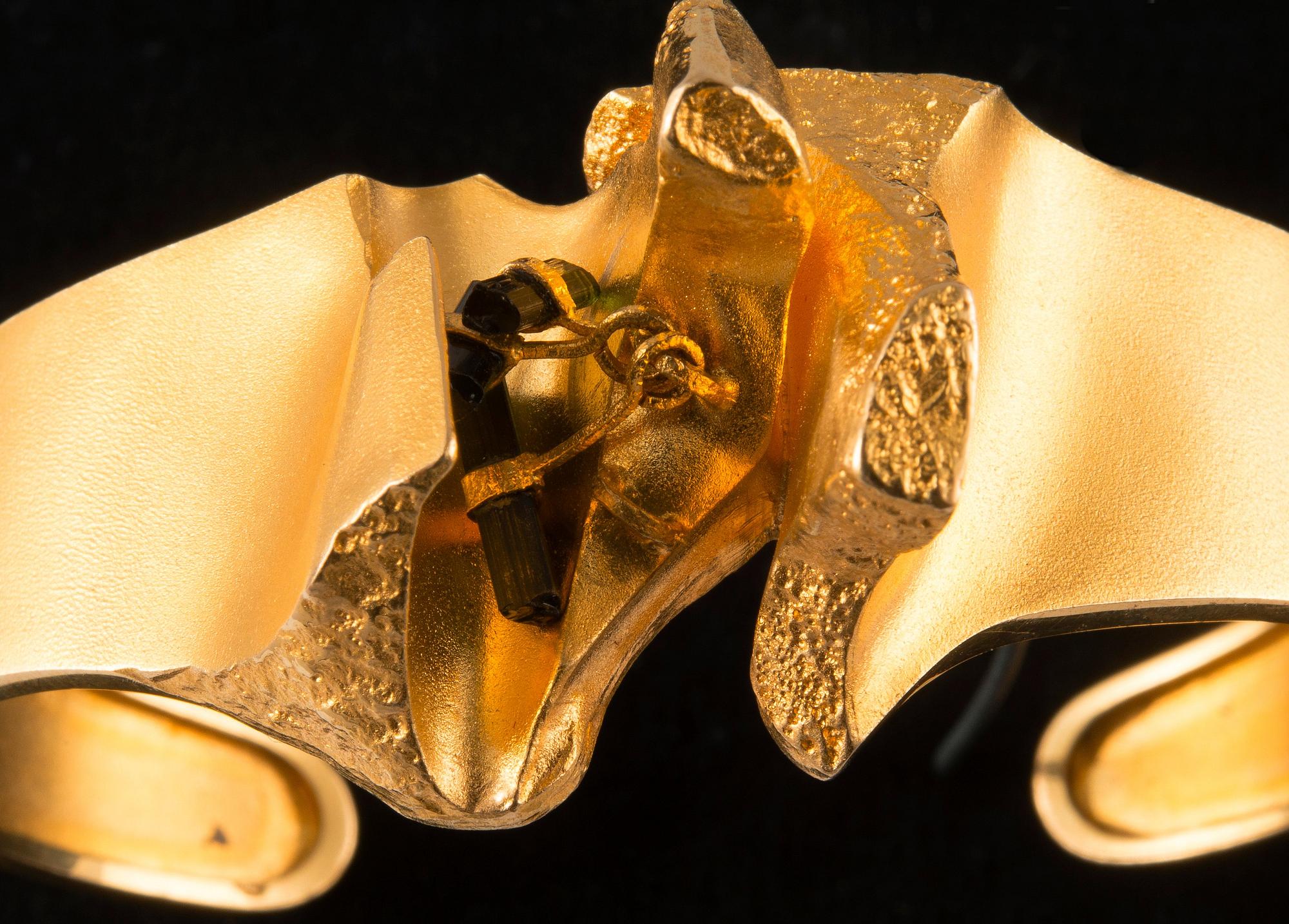 ARMRING, 18k guld med turmalin, "Ultima Thule", Lapponia exportstämplar. Vikt 44,6 g.
