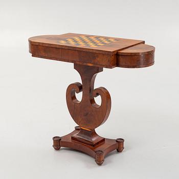 A Swedish Empire mahogany games' table attributed to J. Öman (master in Stockholm 1815-33).