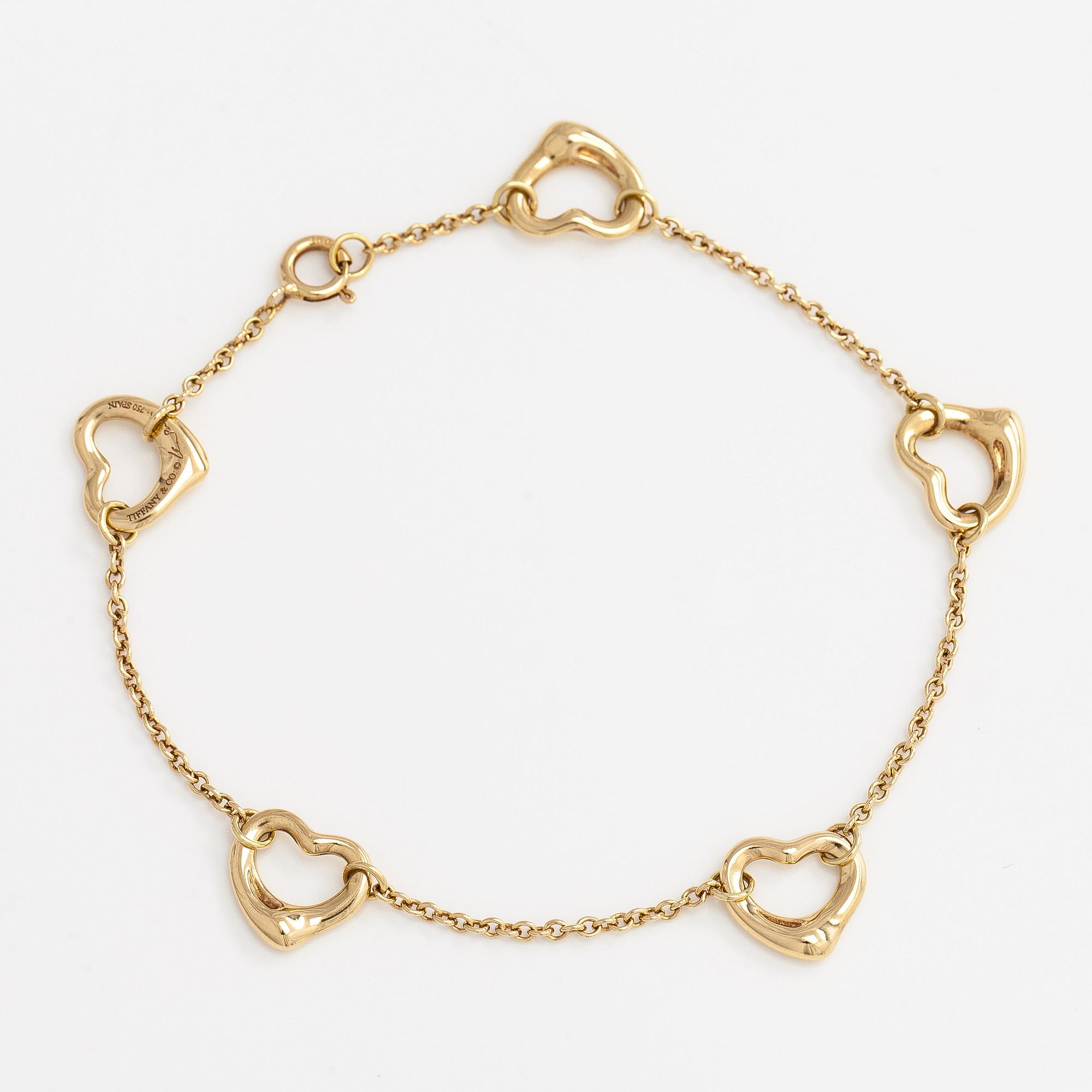 Tiffany & Co, Elsa Peretti, an 18K gold 'Open Heart' bracelet.