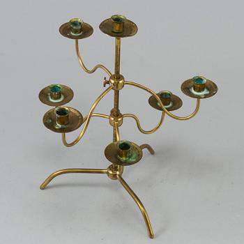 A brass kandelabra model 2454 by Josef  Frank for Firma Svenskt Tenn.