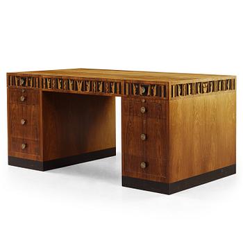 A Carl Malmsten palisander desk, Åtvidaberg, Sweden circa 1934.