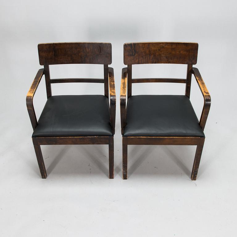 A pair of 1930's armchairs.