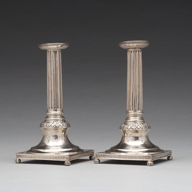 A pair of Swedish early 19th century silver candlesticks, mark of Anders Fornholm, Stockholm 1801.