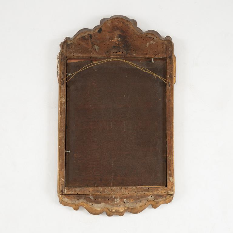 A Swedish rococo giltwood mirror, later part 18th century.