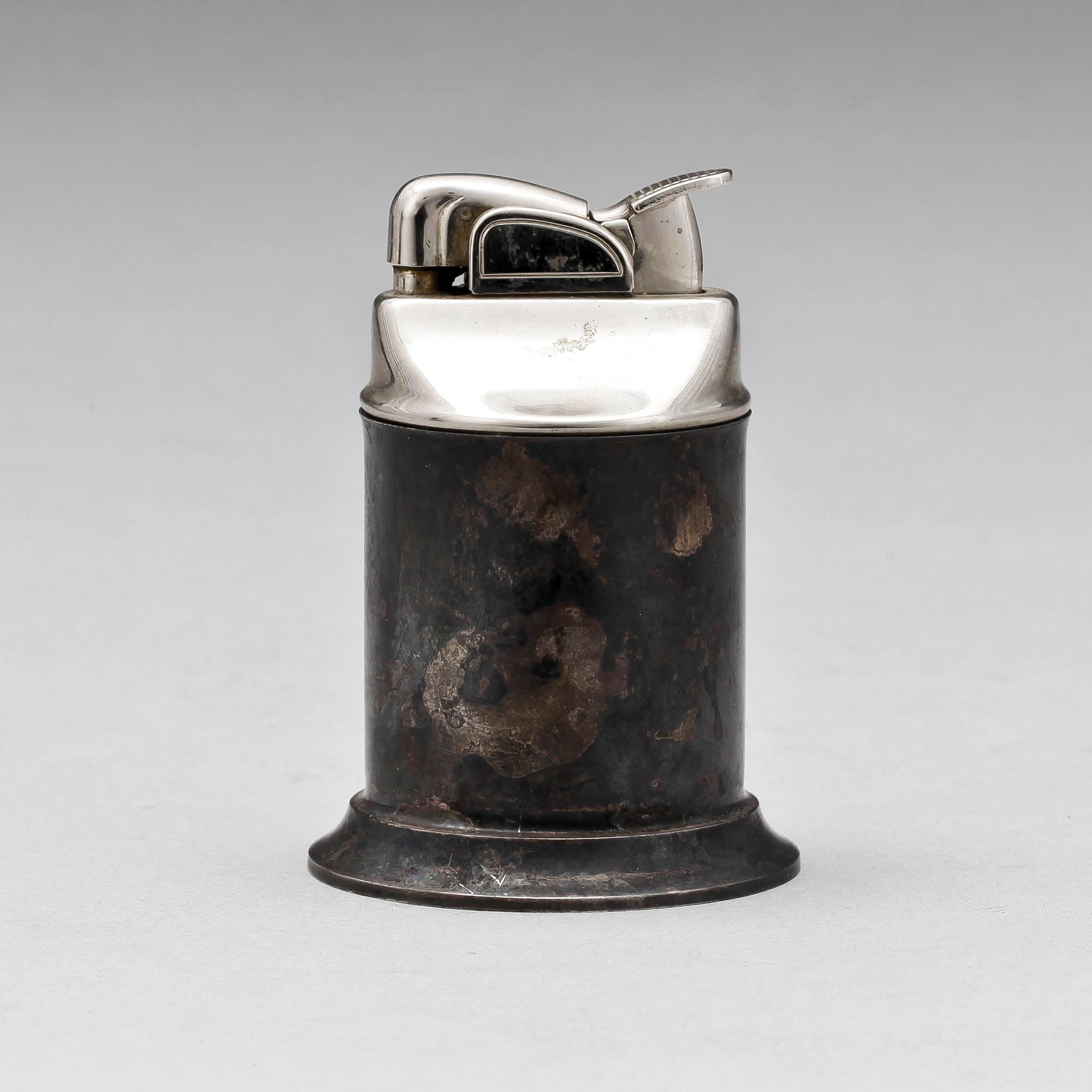 CIGARETTÄNDARE. Fodral i sterling silver Tiffany & Co, New York samt tändare Evans, USA.