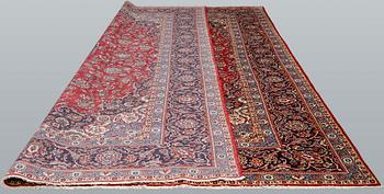 A Keshan carpet, approx. 418 x 315 cm.