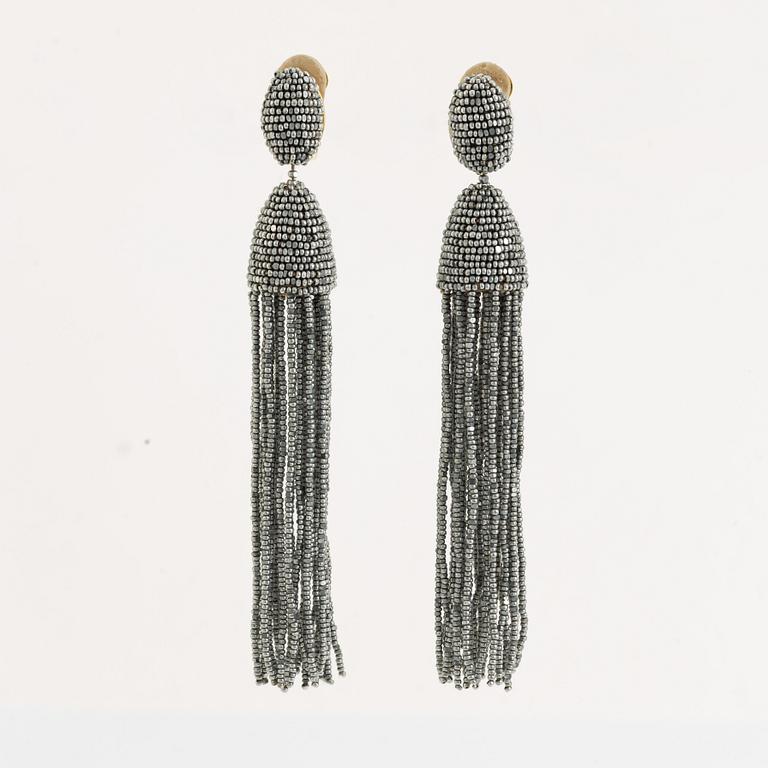 Oscar De La Renta, tassel earrings.