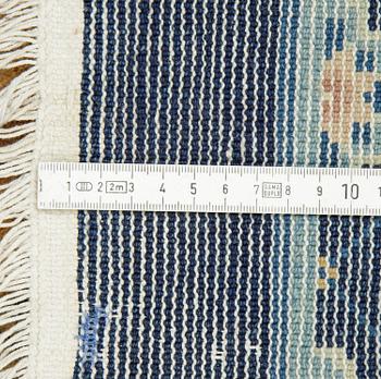 A carpet, semi-antique/Old China, ca 302 x 196 cm.