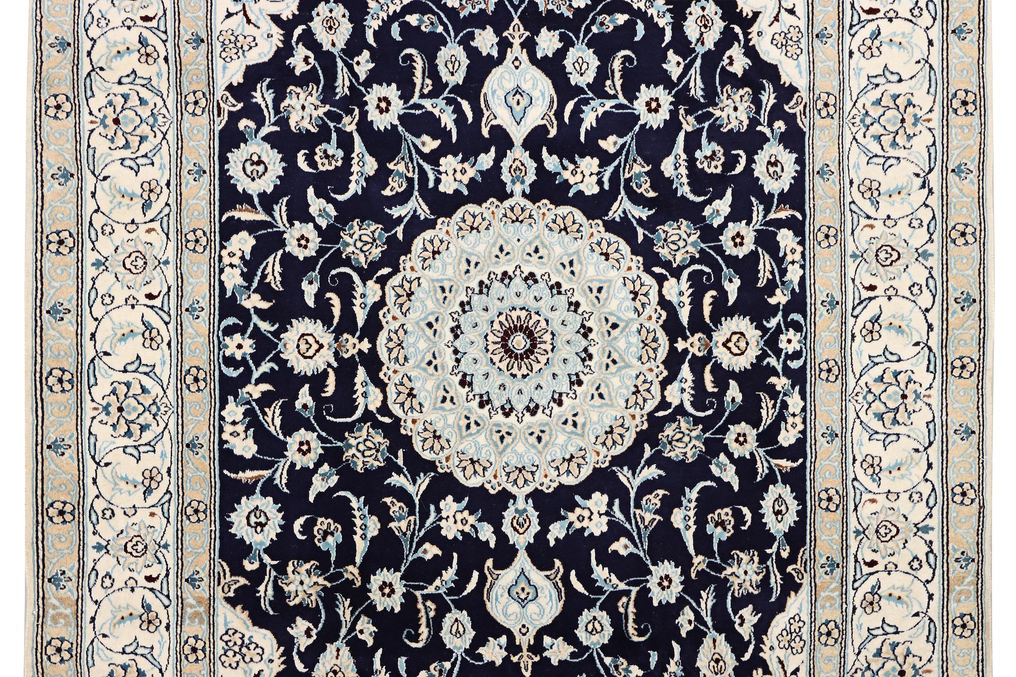 A part silk Nain rug, 9LA, c. 292 x 190 cm.