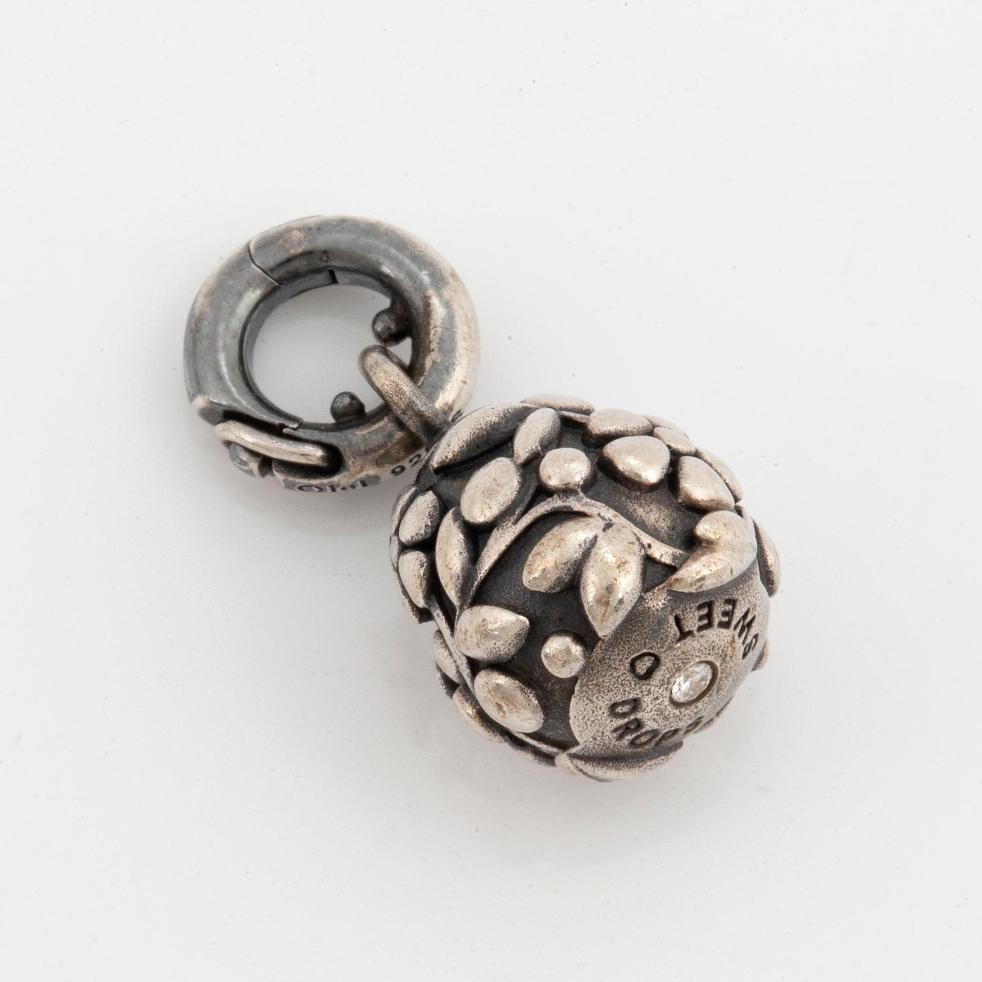 OLE LYNGGAARD, sweet drops charm, silver with brilliant-cut diamond.