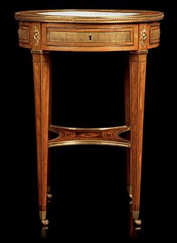 A Gustavian tea table with a porcelain dish by Georg Haupt.