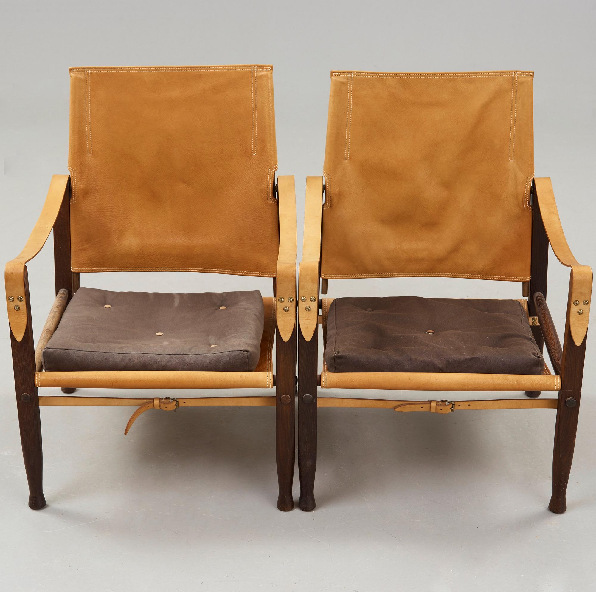 a pair of 'Safari' oak and leather armchairs, Rud. Rasmussen, Denmark, probably 1950's.