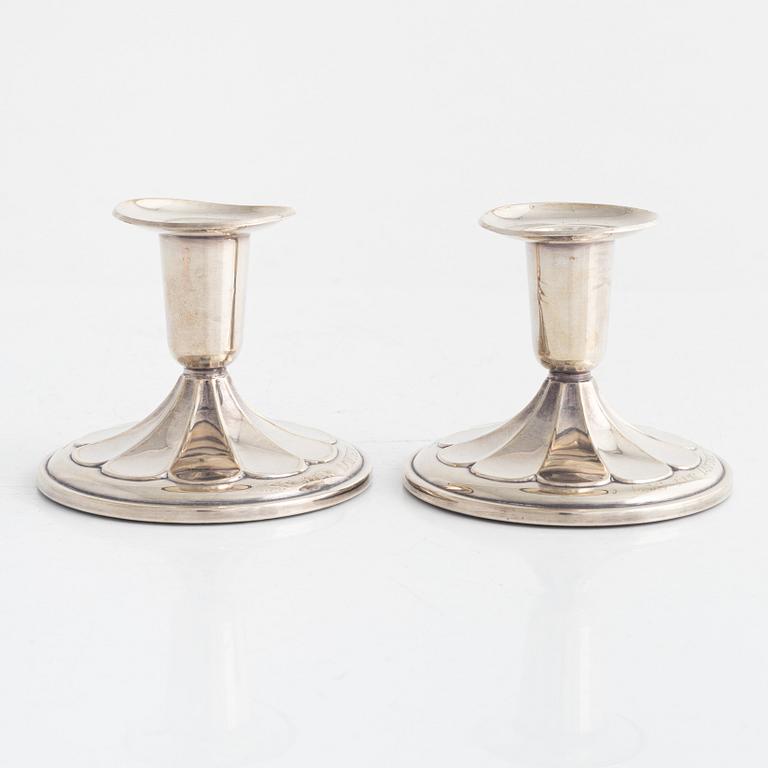 A pair of Swedish silver candlesticks, mark of K&EC, Gothenburg 1959.