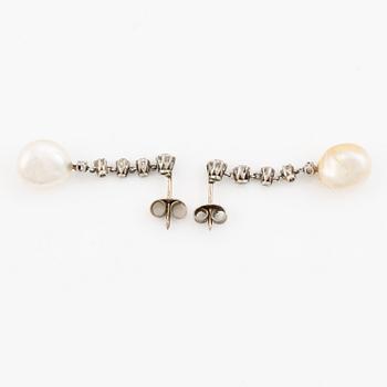 A pair of  earrings in white gold with pearls and old-cut diamonds.