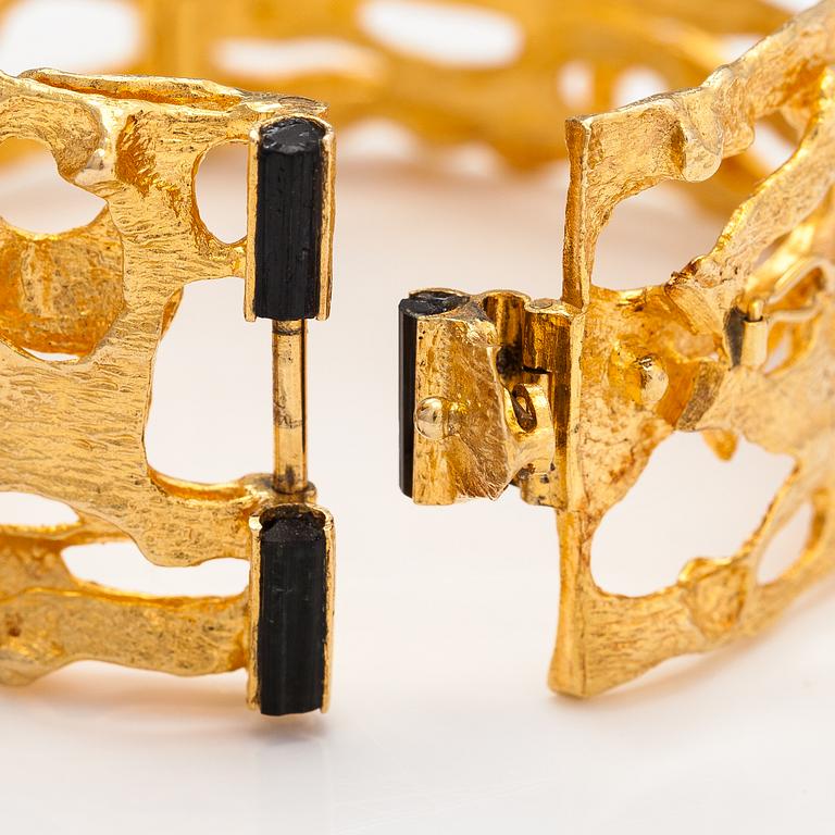 Björn Weckström, "Sacrificial fire", An 18K gold and tourmaline bracelet. Lapponia 1971.