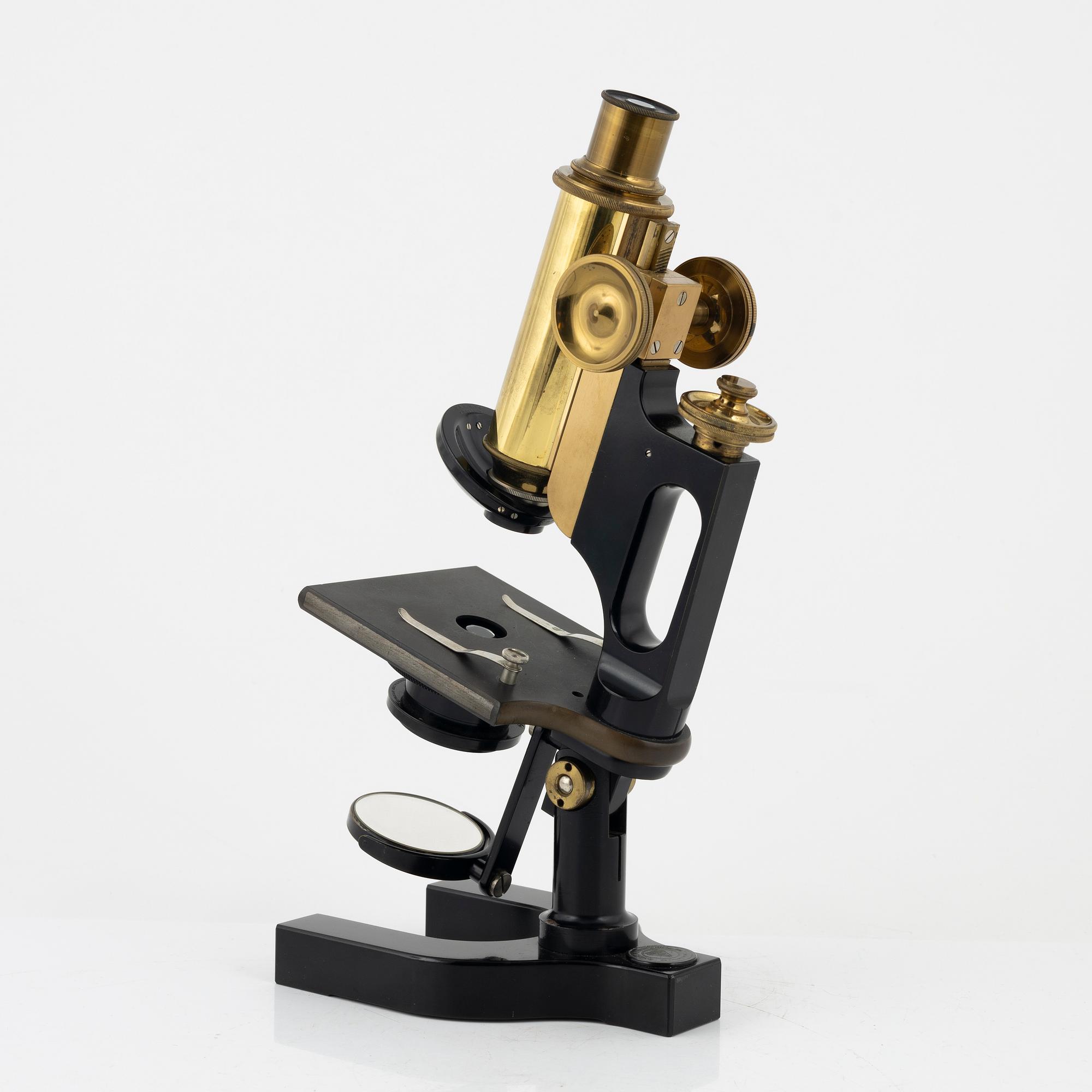 A microscope with accessories, Bausch & Lomb Optical Co. Rochester N.Y, early 20th Century.