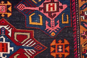 A semi-antique Anatolian runner, c. 409 x 159 cm.