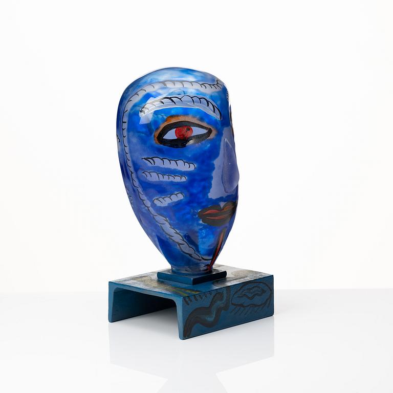 Ulrica Hydman-Vallien, a painted glass and iron sculpture of a face, Sweden.