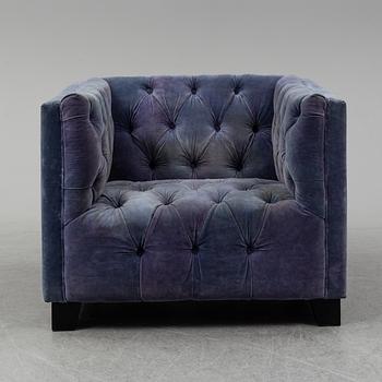 A velvet covered easy chair, 2010.