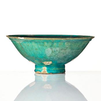 A conic Kashan pottery bowl, central Persia, 11th century.