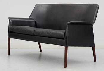 An Ejner Larsen and A Bender Madsen black leather sofa by Willy Beck, Denmark.