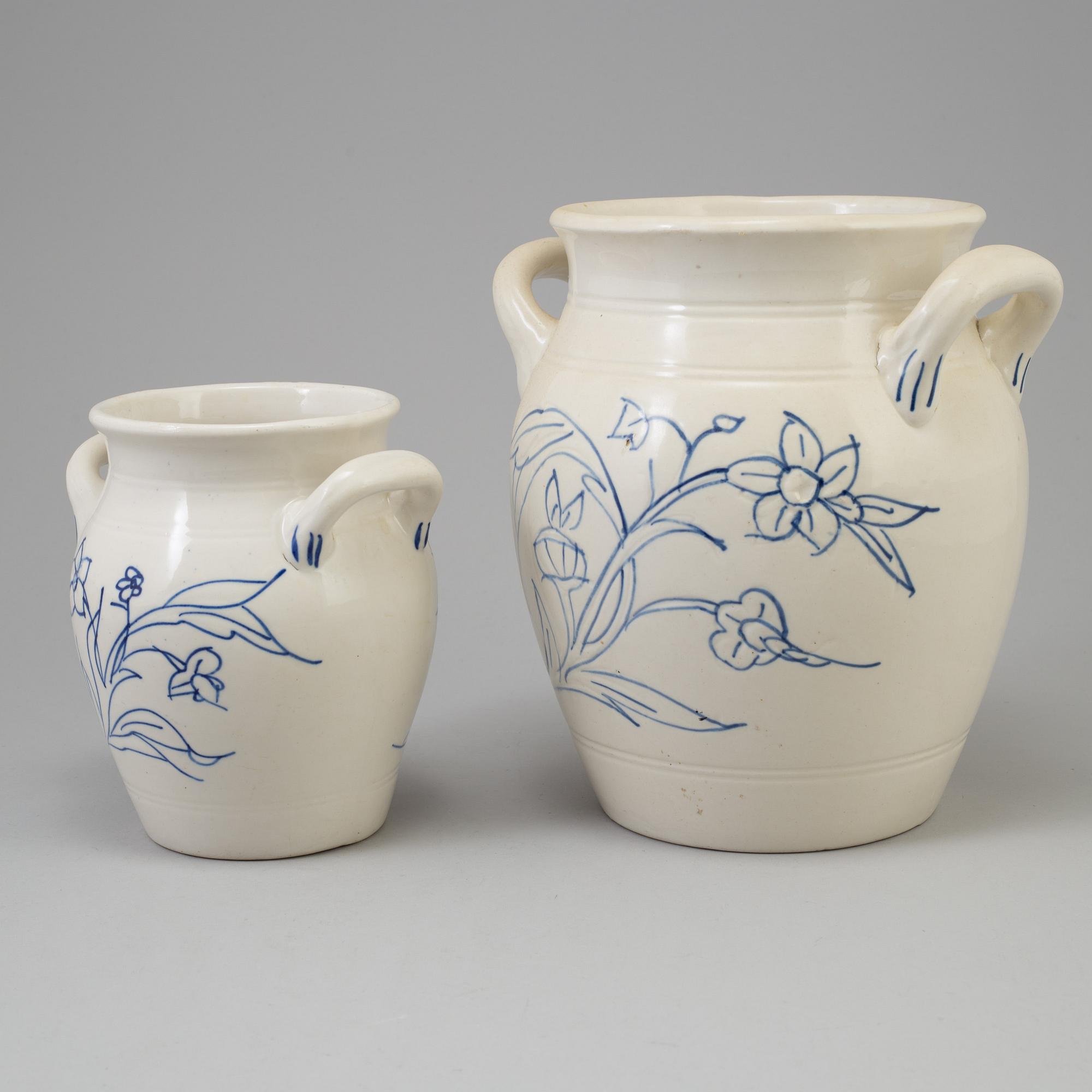 A set of four 20th century blue and white jars by Rörstrand.