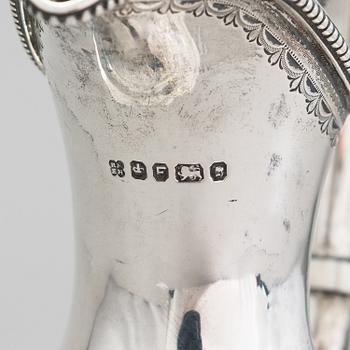 MARTIN, HALL & CO, A sterling silver pitcher, Sheffield 1873.