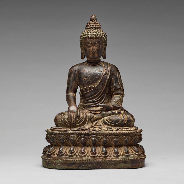 A bronze seated figure of Shakayamuni buddha, Mingtype.