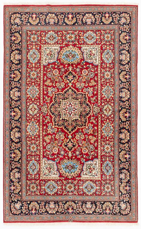 An oriental rug, c. 260 x 162 cm.